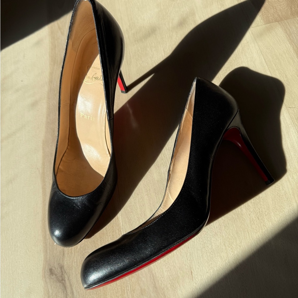 Christian Louboutin Black Leather Pumps